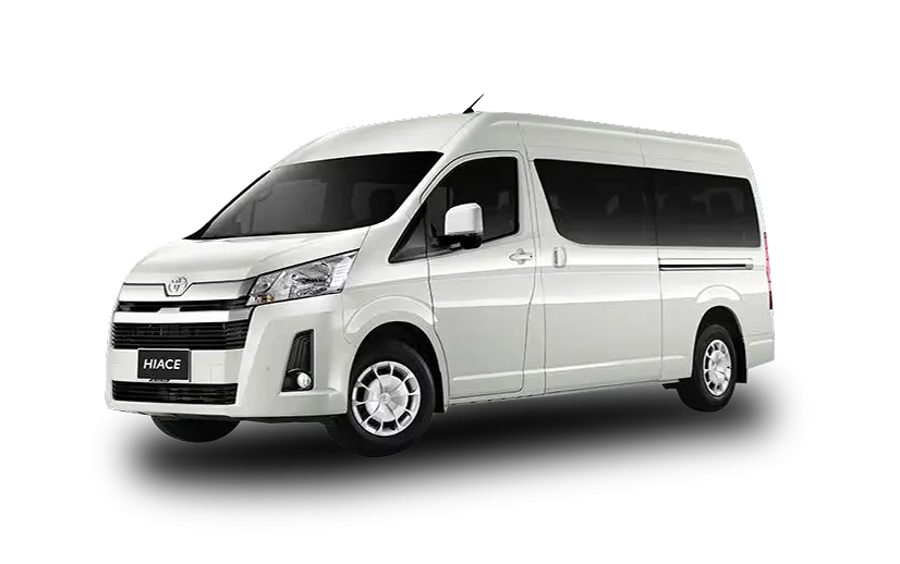 White Toyota Hiace (2025) 10-seater rental van side view